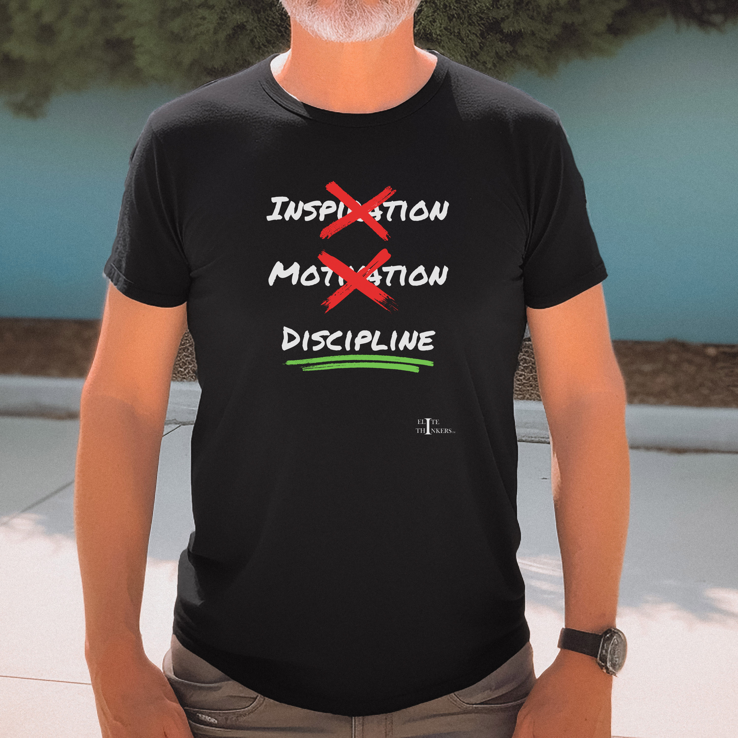 Discipline underlined, on a black tee.