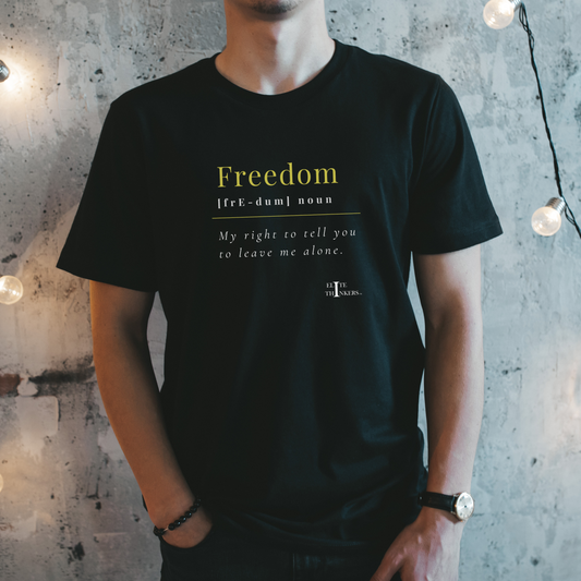 Freedom mock-definition on a black tee.