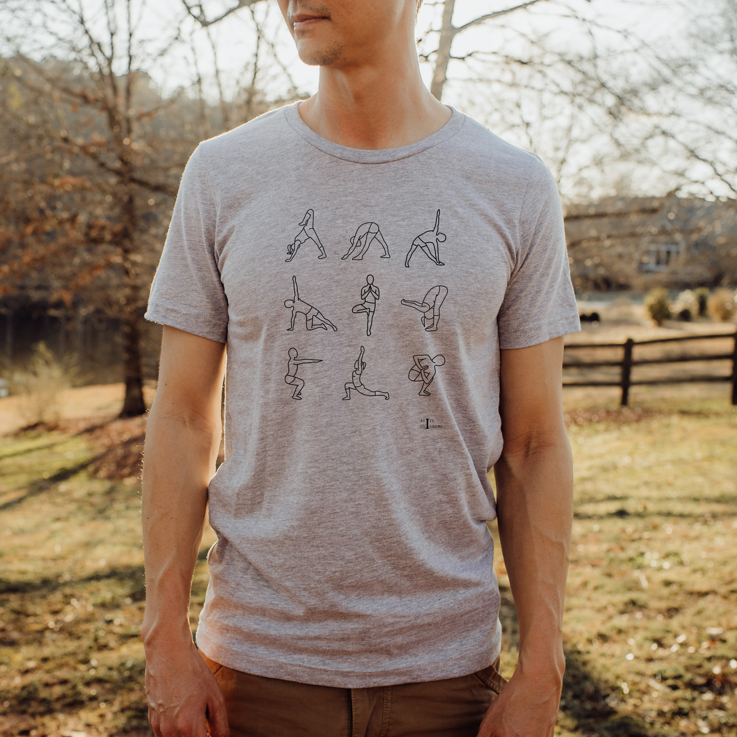 Yoga poses, on heather gray tee.